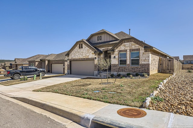 view of front of property with brick siding, fence, concrete driveway, stone siding, and board and batten siding