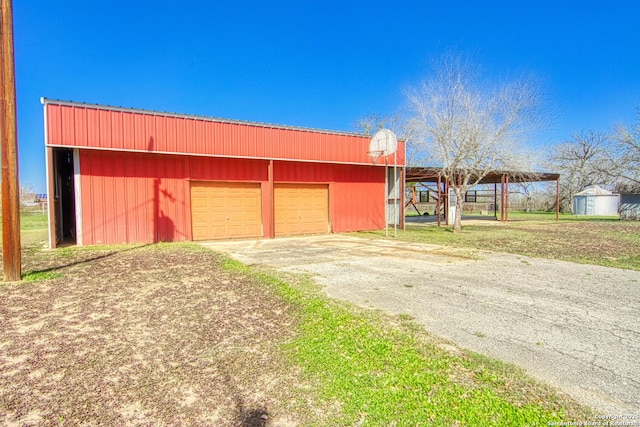 garage with driveway