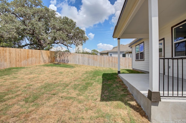 view of yard with a patio and a fenced backyard