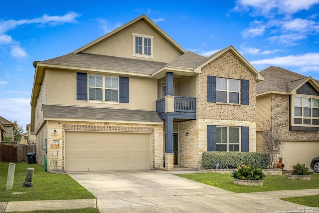 view of front of property featuring an attached garage, a front yard, concrete driveway, and stucco siding