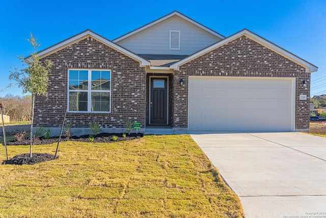 ranch-style home with a garage, driveway, a front lawn, and brick siding