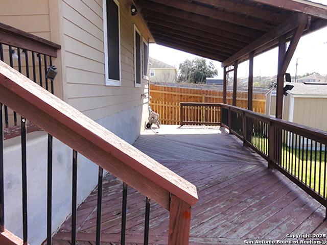 wooden terrace with fence