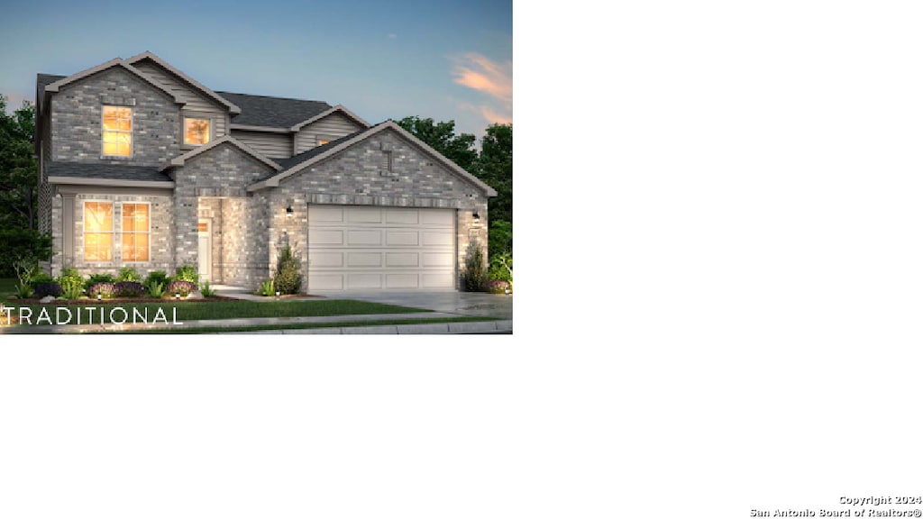 view of front of home featuring a garage, concrete driveway, and brick siding