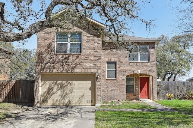 traditional-style house featuring brick siding, fence, driveway, and an attached garage