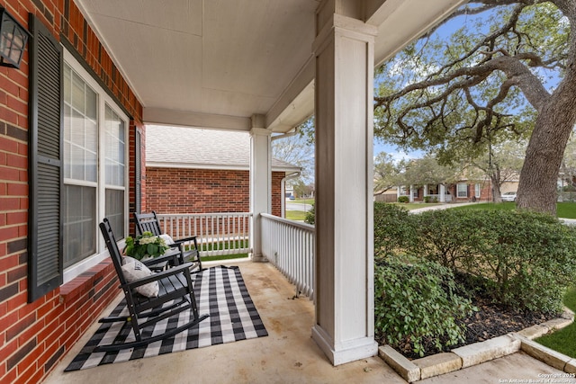 view of patio featuring a porch