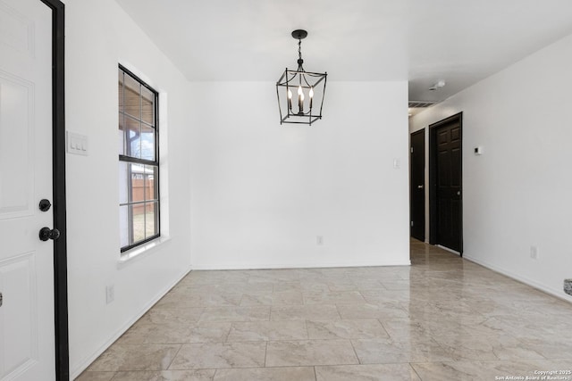 unfurnished dining area featuring a chandelier, visible vents, and baseboards