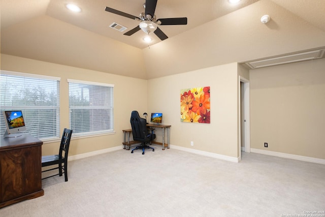 carpeted home office with attic access, visible vents, vaulted ceiling, and baseboards