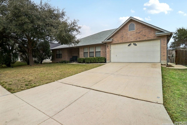 single story home featuring a garage, concrete driveway, brick siding, and a front lawn