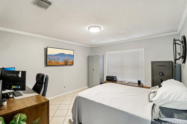 bedroom featuring light tile patterned floors, baseboards, visible vents, ornamental molding, and a textured ceiling