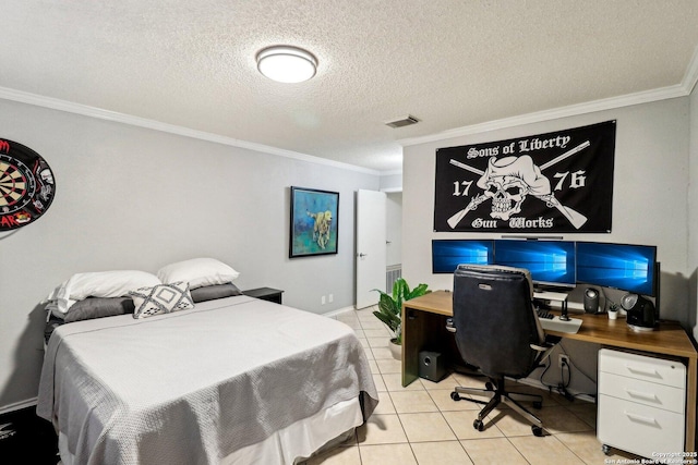 bedroom featuring light tile patterned floors, visible vents, ornamental molding, and a textured ceiling