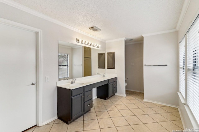 full bathroom with toilet, a sink, visible vents, ornamental molding, and double vanity