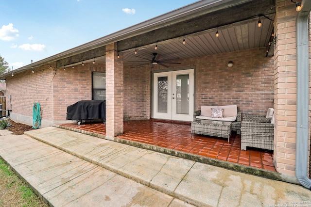 view of patio / terrace featuring french doors and a grill