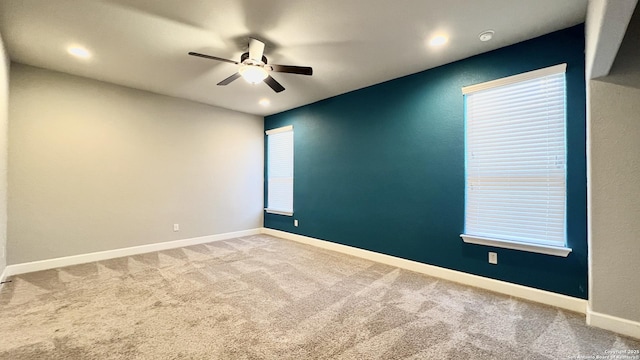 empty room featuring carpet, ceiling fan, baseboards, and recessed lighting