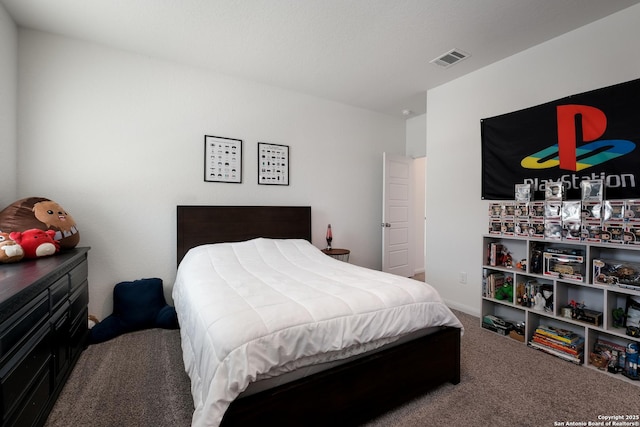 carpeted bedroom with visible vents