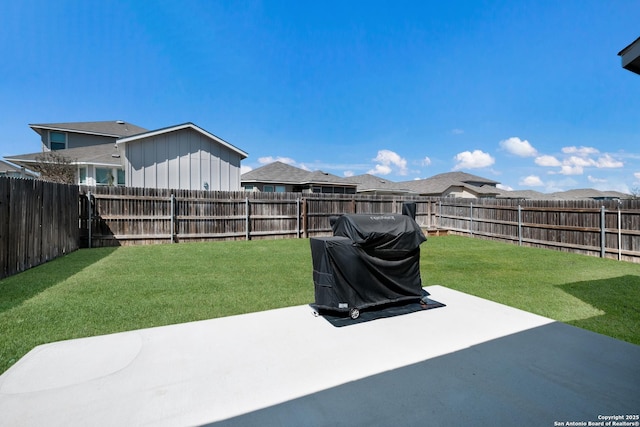 view of yard featuring a fenced backyard and a patio