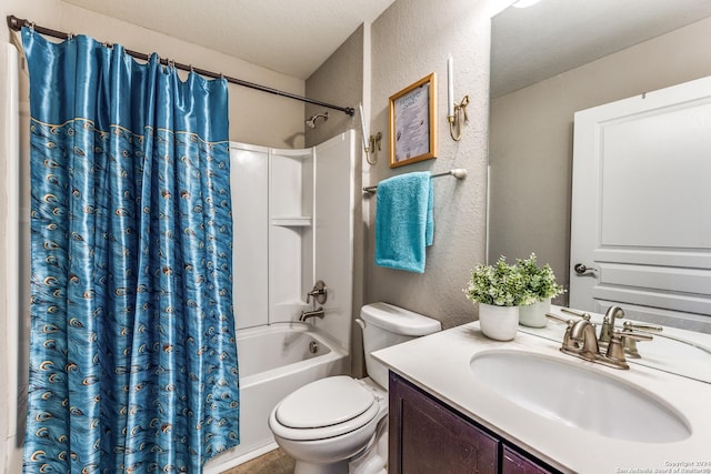 full bath with a textured wall, vanity, toilet, and shower / bath combo with shower curtain