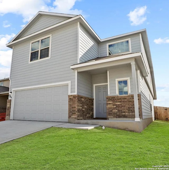 view of front of property featuring driveway, brick siding, a front lawn, and an attached garage