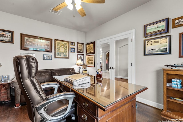 office featuring visible vents, baseboards, a ceiling fan, french doors, and dark wood finished floors