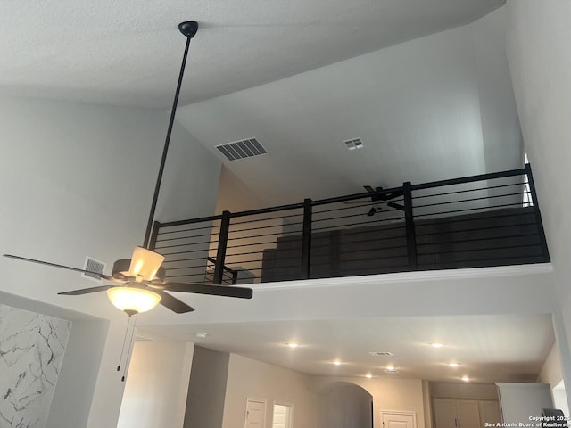 room details with visible vents and a ceiling fan