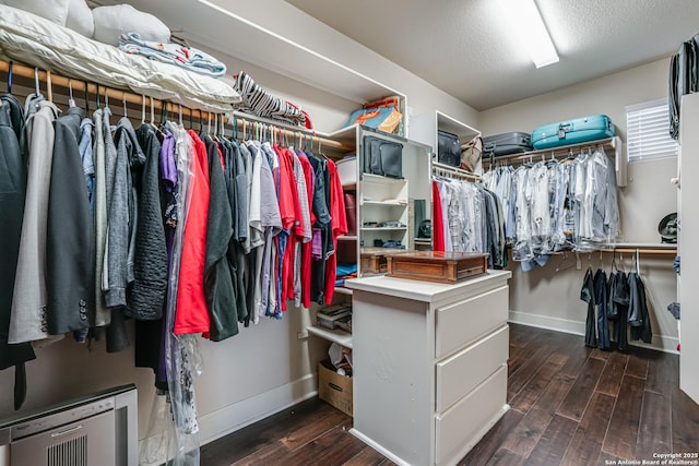 spacious closet with wood finished floors