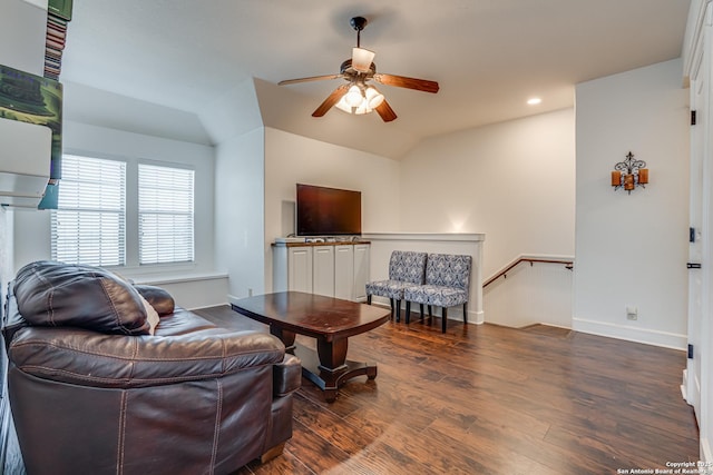 living area featuring baseboards, a ceiling fan, wood finished floors, vaulted ceiling, and recessed lighting