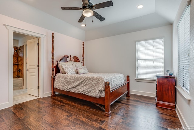 bedroom featuring vaulted ceiling, recessed lighting, wood finished floors, and baseboards