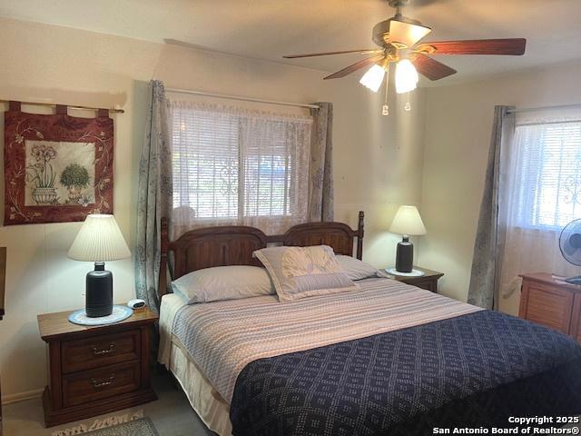 bedroom featuring a ceiling fan