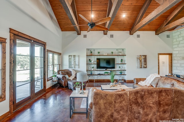 living area with wooden ceiling, ceiling fan, concrete flooring, high vaulted ceiling, and beam ceiling