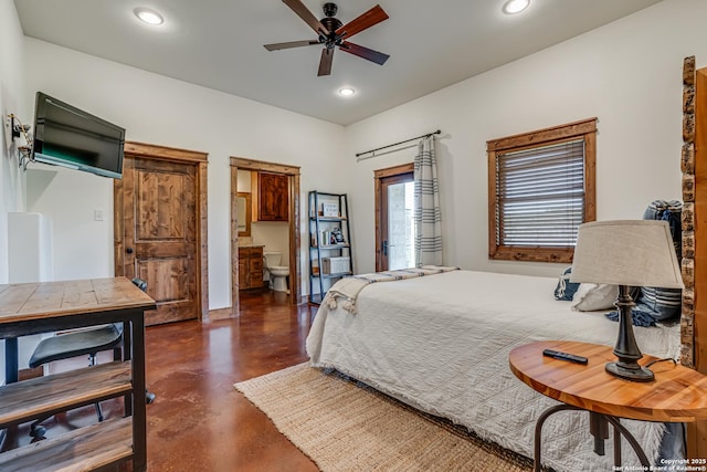 bedroom with finished concrete floors and recessed lighting