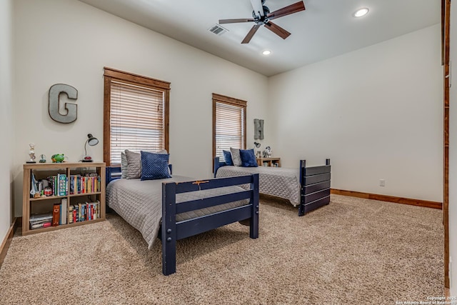 bedroom with multiple windows, visible vents, carpet flooring, and recessed lighting