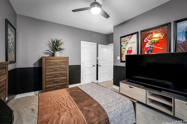 carpeted bedroom with a ceiling fan