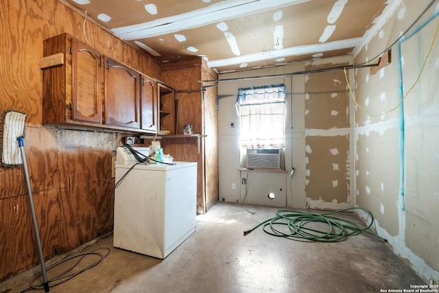 laundry area featuring washer / clothes dryer, cooling unit, and cabinet space