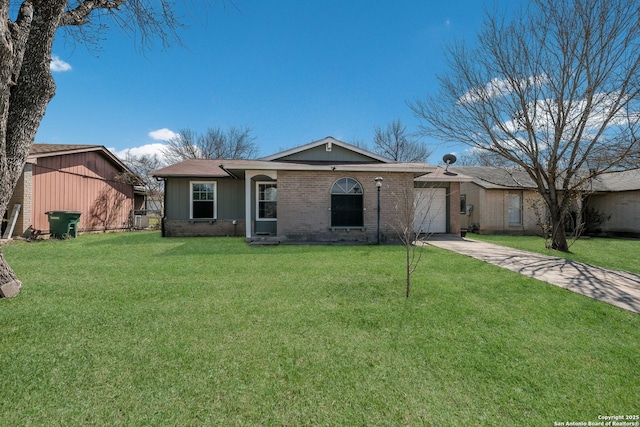 view of front of house featuring driveway, an attached garage, a front lawn, and brick siding