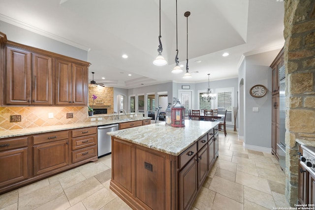 kitchen with light stone counters, hanging light fixtures, decorative backsplash, stainless steel dishwasher, and ornamental molding