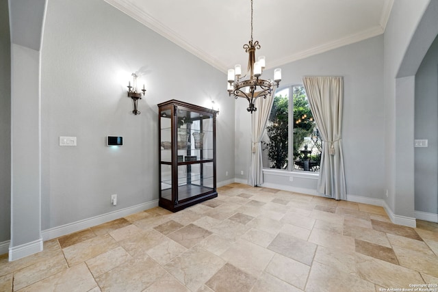 unfurnished dining area featuring arched walkways, a notable chandelier, ornamental molding, vaulted ceiling, and baseboards