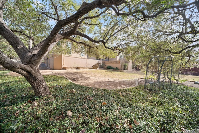 view of yard with fence