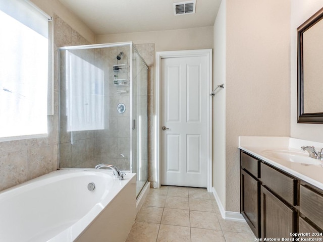 bathroom featuring a garden tub, visible vents, a shower stall, vanity, and tile patterned floors