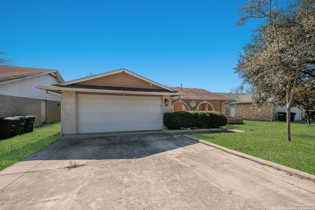 single story home with an attached garage, concrete driveway, and a front yard