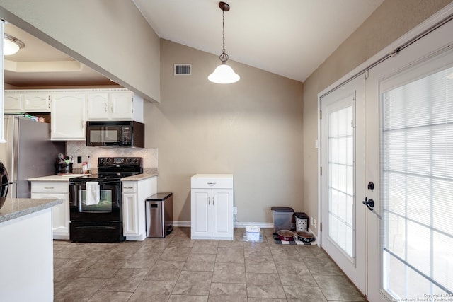 4010 Briarcrest, San Antonio, TX 78247 - kitchen with french doors, lofted ceiling, visible vents, white cabinetry, and black appliances