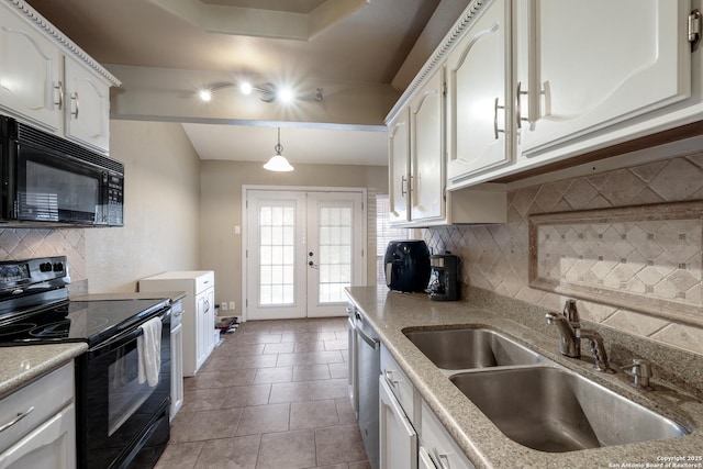 4010 Briarcrest, San Antonio, TX 78247 - kitchen with a sink, white cabinets, french doors, black appliances, and tasteful backsplash