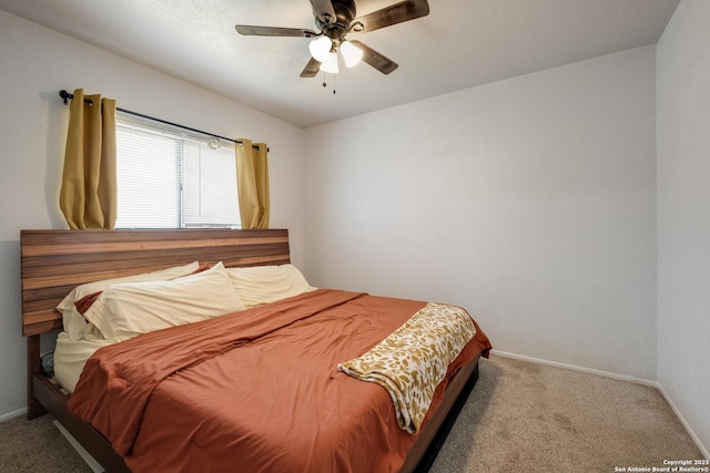 4010 Briarcrest, San Antonio, TX 78247 - carpeted bedroom with baseboards and a ceiling fan