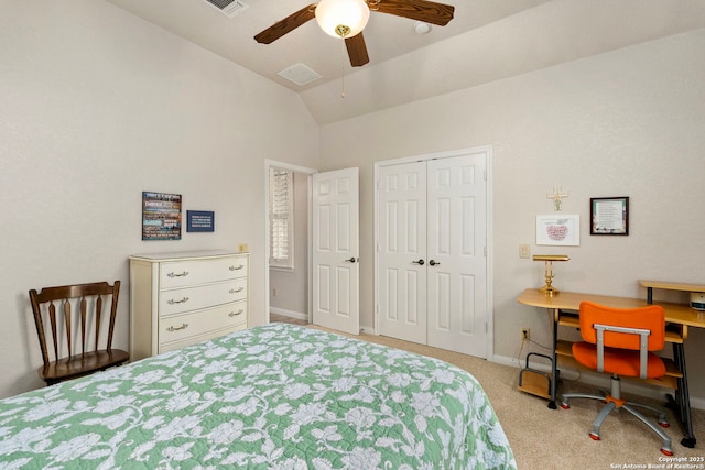 bedroom with baseboards, a ceiling fan, vaulted ceiling, carpet floors, and a closet