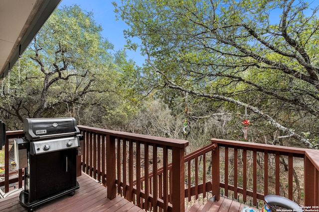 wooden deck featuring grilling area