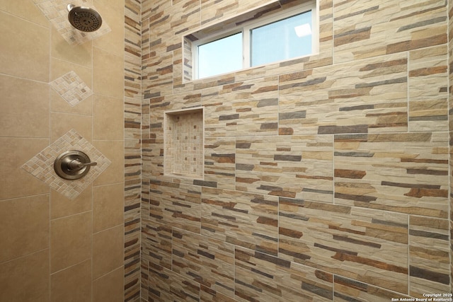 full bath with tiled shower