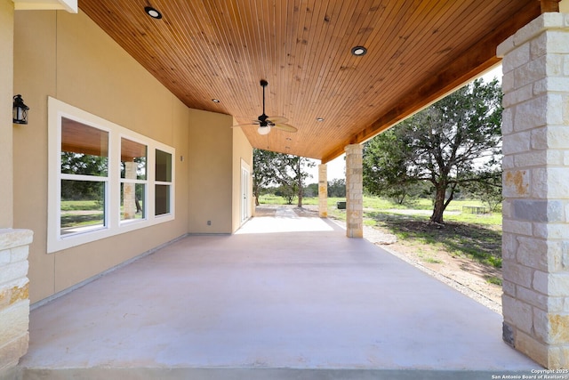 view of patio featuring ceiling fan