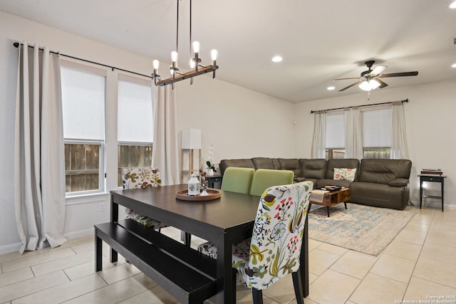 dining space with a ceiling fan, recessed lighting, baseboards, and light tile patterned floors