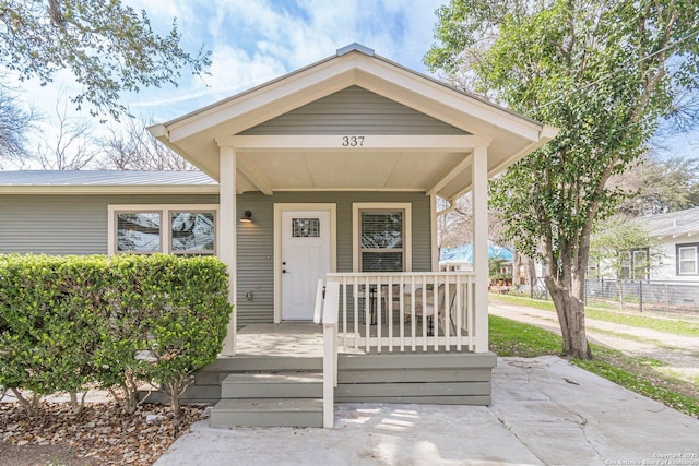 entrance to property with covered porch