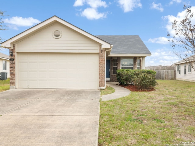 ranch-style house with a garage, a shingled roof, concrete driveway, a front lawn, and brick siding