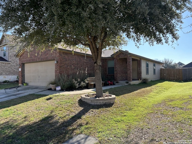 view of front of house featuring a garage, a front yard, brick siding, and fence