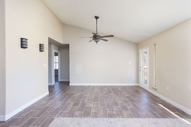 620 County Road 6846, Lytle, TX 78052 - empty room featuring vaulted ceiling, wood finished floors, a ceiling fan, and baseboards